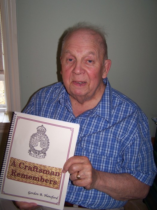Gordon Hansford with his book on WWII