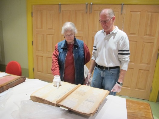 Merrily Aubrey and Ken Kaiser with ledger